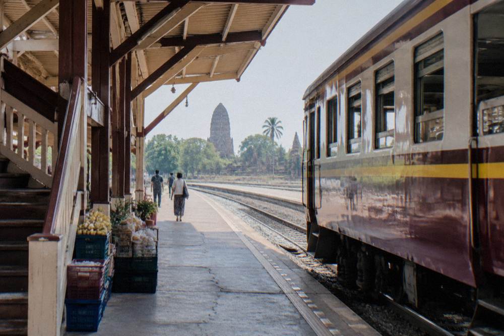 Railway platform with a commuter train at a Bangkok terminal station